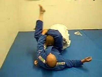 BJJ-Instruction-Rolling-Triangle-from-Side-Control